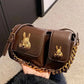 Women camel baguette bag with squirrel accessory design stylish shoulder handbag